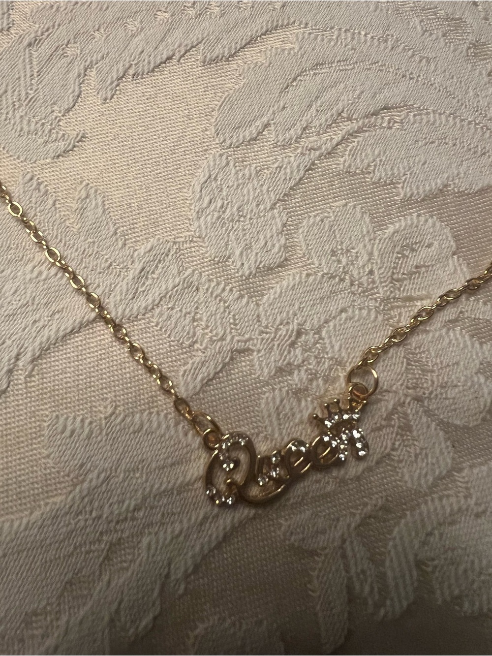 Gold Colored Love Script Pendant Necklace with Crystal Accent